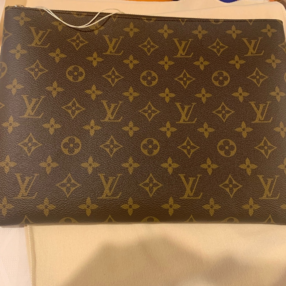 Absolutely stunning brand new, authentic Large  Louis Vuitton  hot pouch/ clutch